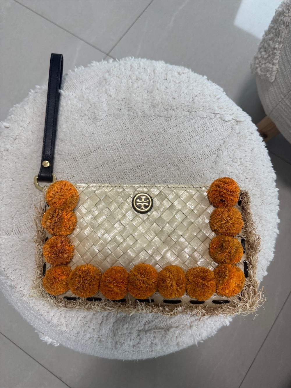 Tory Burch Cream Woven Wristlet with Orange Pom-Poms